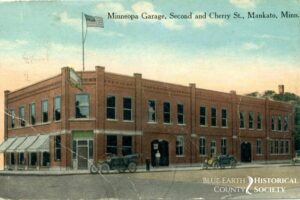 Then and Now Minneopa Garage Then on the corner of Second and Cherry Streets, color postcard