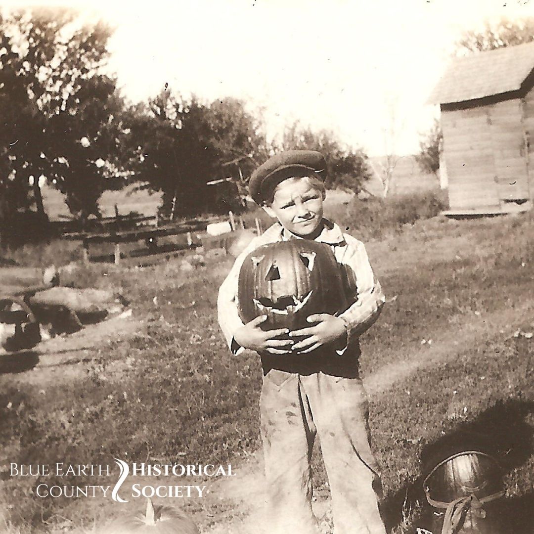 Boy with a jack-o-lantern for Halloween